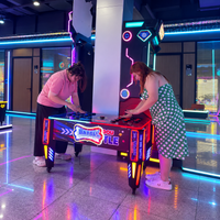 Load image into Gallery viewer, Two people playing Dou Dou Battle reaction arcade game
