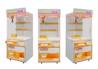 Load image into Gallery viewer, Orange mini claw machine, front and side views
